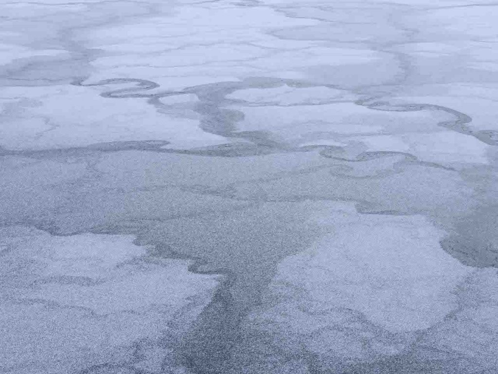 Icy Patchwork Quilt has formed overnight on the surface of Lake Michigan