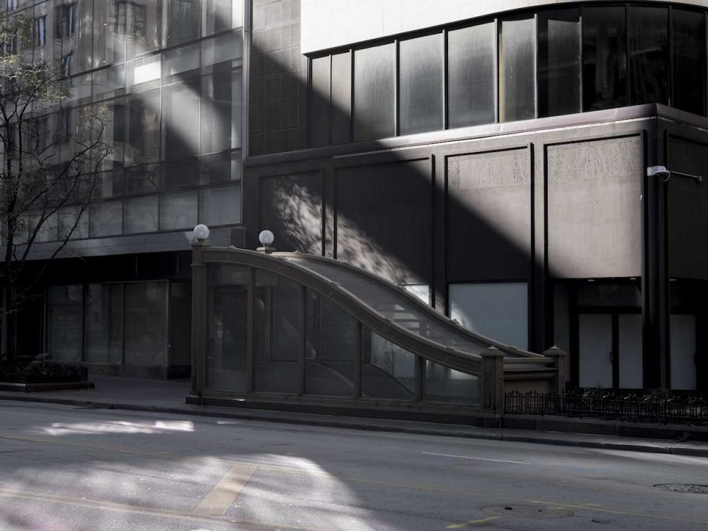 South State Street is empty late in the afternoon here in Chicago earlier this fall. The light on this day evocative of a film set.