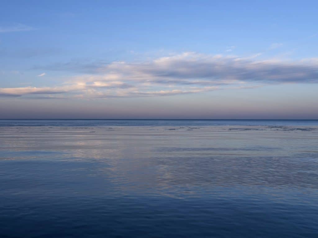 Winter Lake Dawn over a still Lake Michigan