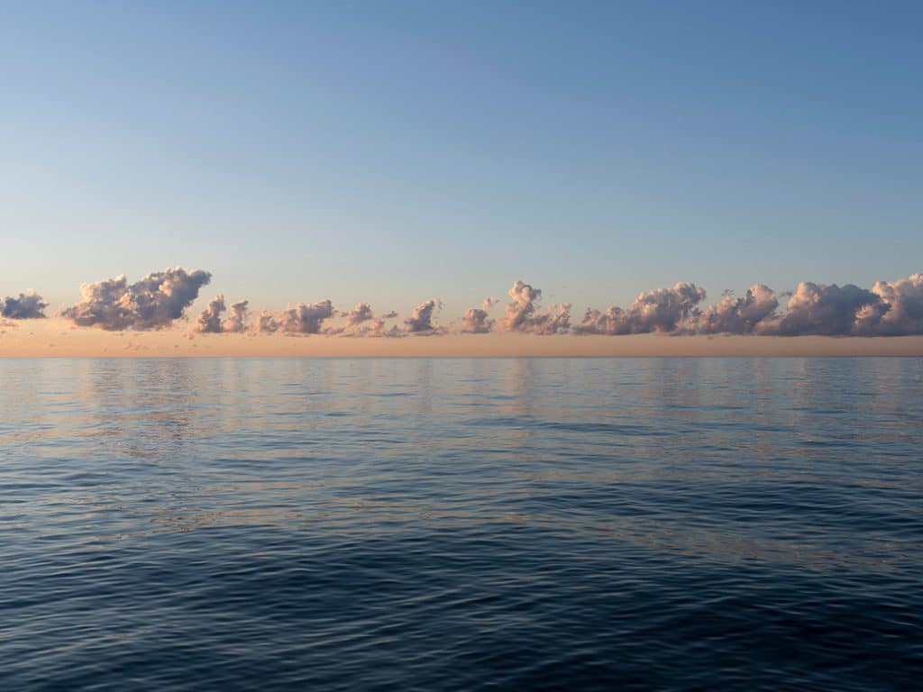 A Row of Clouds sit above Lake Michigan
