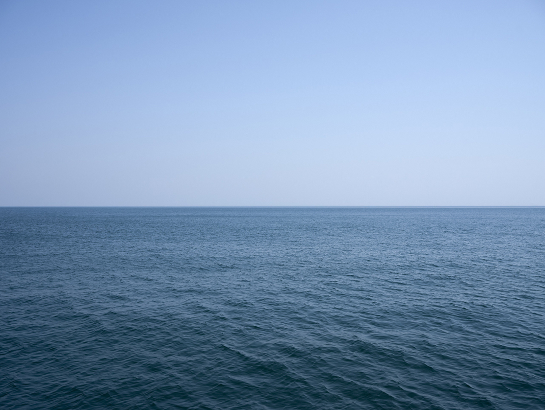 A late August day on Lake Michigan without a cloud. One of those days that immediately comes to mind when asked about summer here in Chicago. A day to remember when winter comes and spring seems so far away.