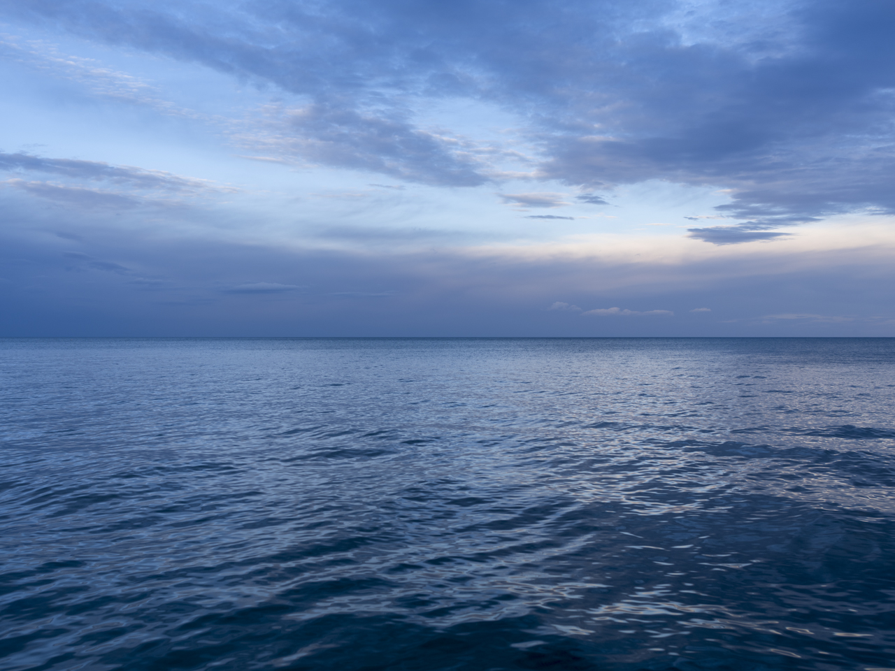 Lake Michigan is rendered in sapphire blues, nearly iridescent in quality on this day, similar in brilliance to the wings of the Morpho Menelaus butterfly. From early in the Lake Series. This is September 27th, 2016.