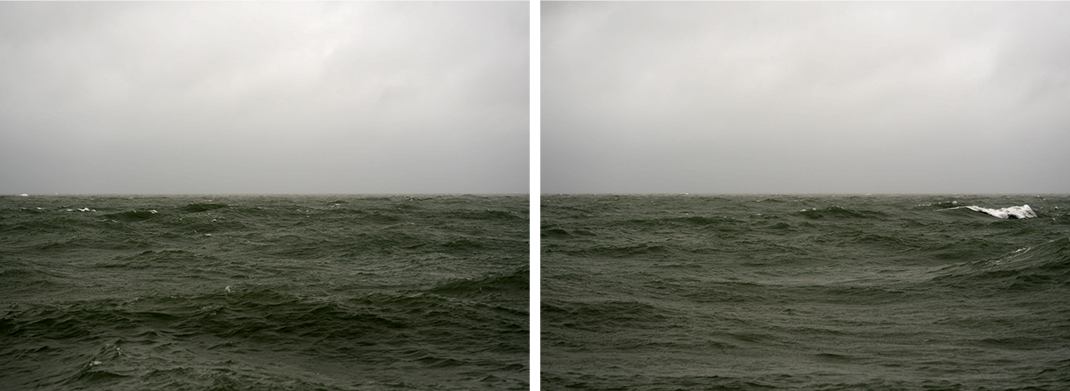 The waters are an olive gray on Lake Michigan today. Rich tonally and textured by rains falling on the water in a lake diptych from 2017. There is a beguiling quality to the lake on a day like this.