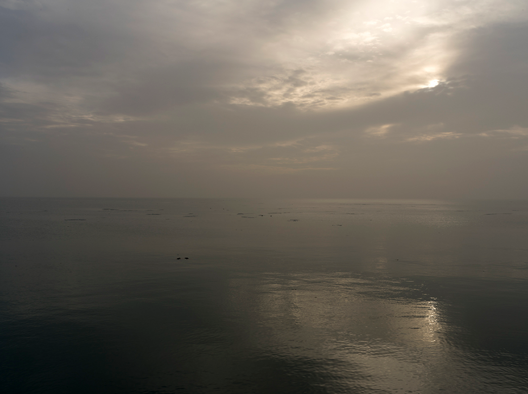 Dawn is coming into light on the lake and clouds fill the sky, filtering the sun through their gauzy layers. Providing this morning with a quality akin to the sublime natural depictions found in the Romanticism movements of Western Europe.