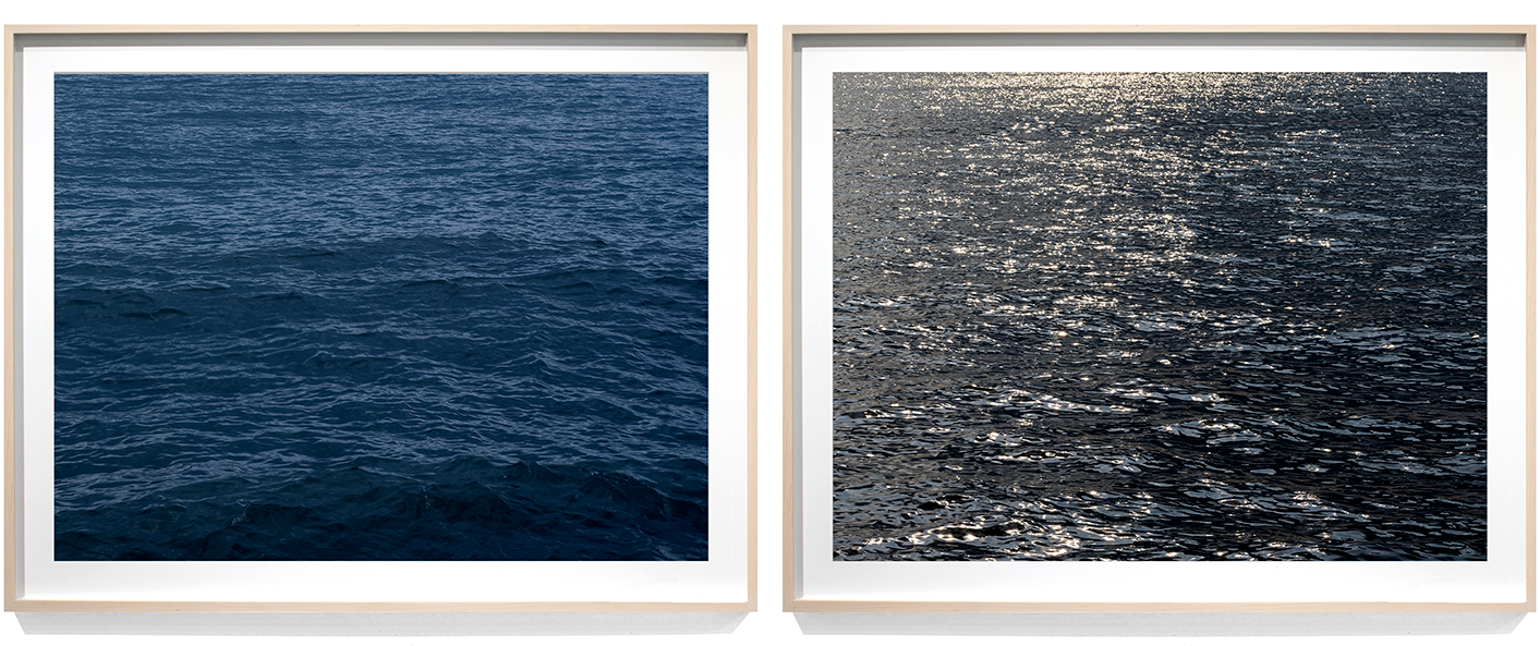 A pair of detail images are shown in wood gallery frames.