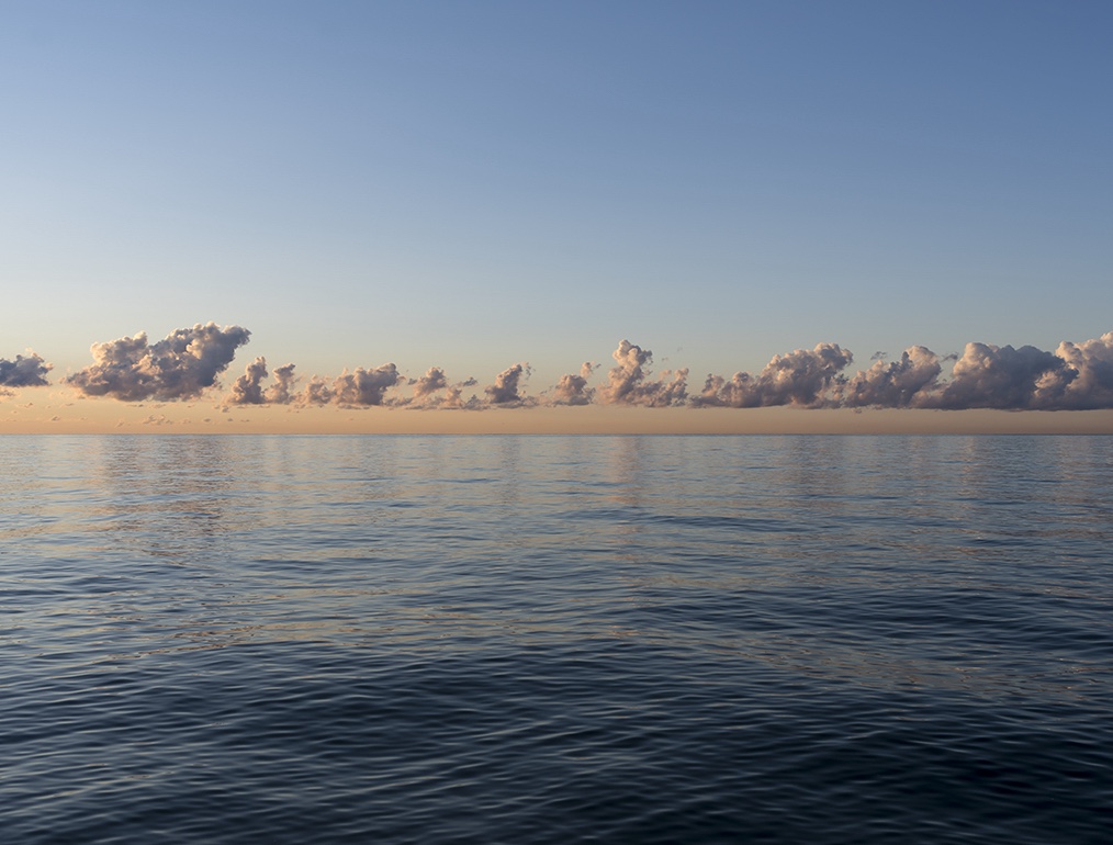 A band of clouds run parallel to the horizon line of Lake Michigan in this photograph from early in the Lake Series. This is August 7th, 2016.