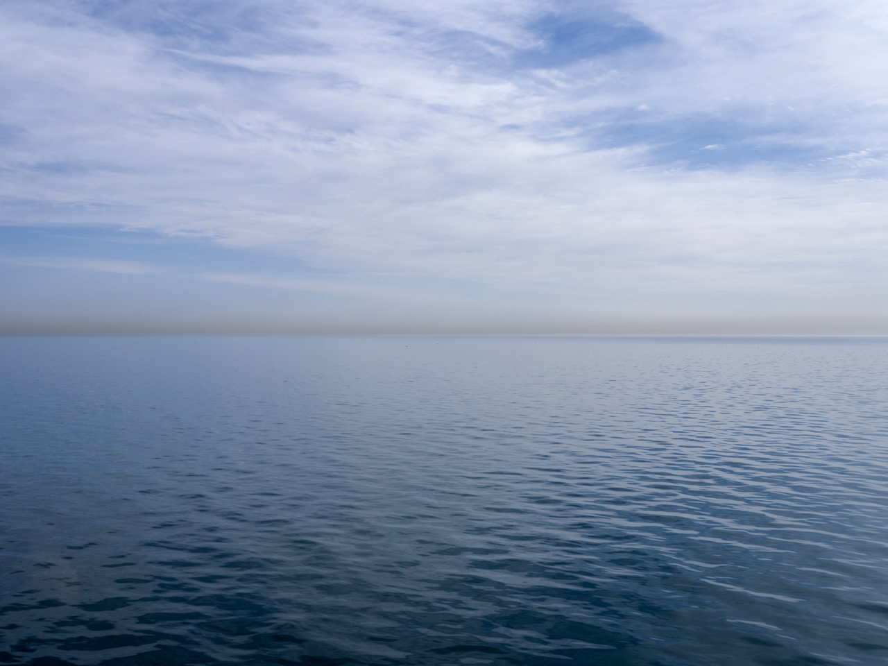  Wild Ducks on the Chicago River by Sterling North, captures perfectly an impulse that I have felt many times myself when photographing Lake Michigan and the surrounding landscape.