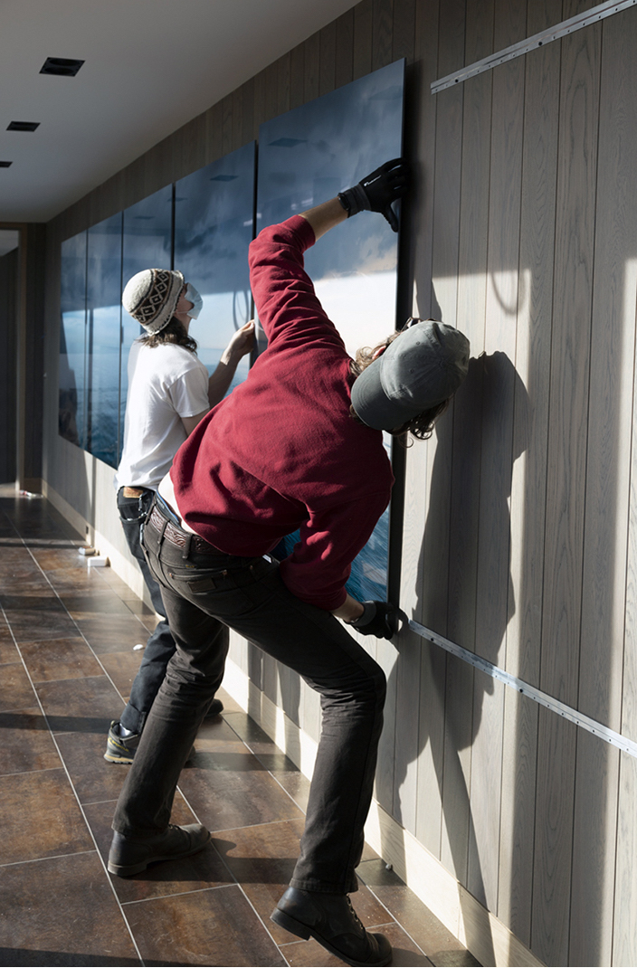 It is always exciting on installation day. Here, we are installing a six-panel, three photograph, Lake Series artwork in a private residence. This is Lake Series Panoramas, April 19th, 2017.
