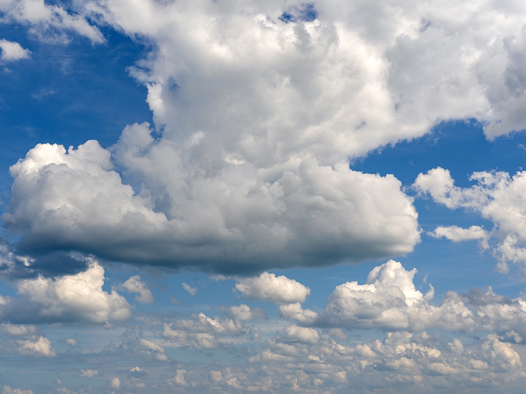 This is The Sky and The Water (5), a fine art photograph featuring clouds perched in the sky over Lake Michigan.
